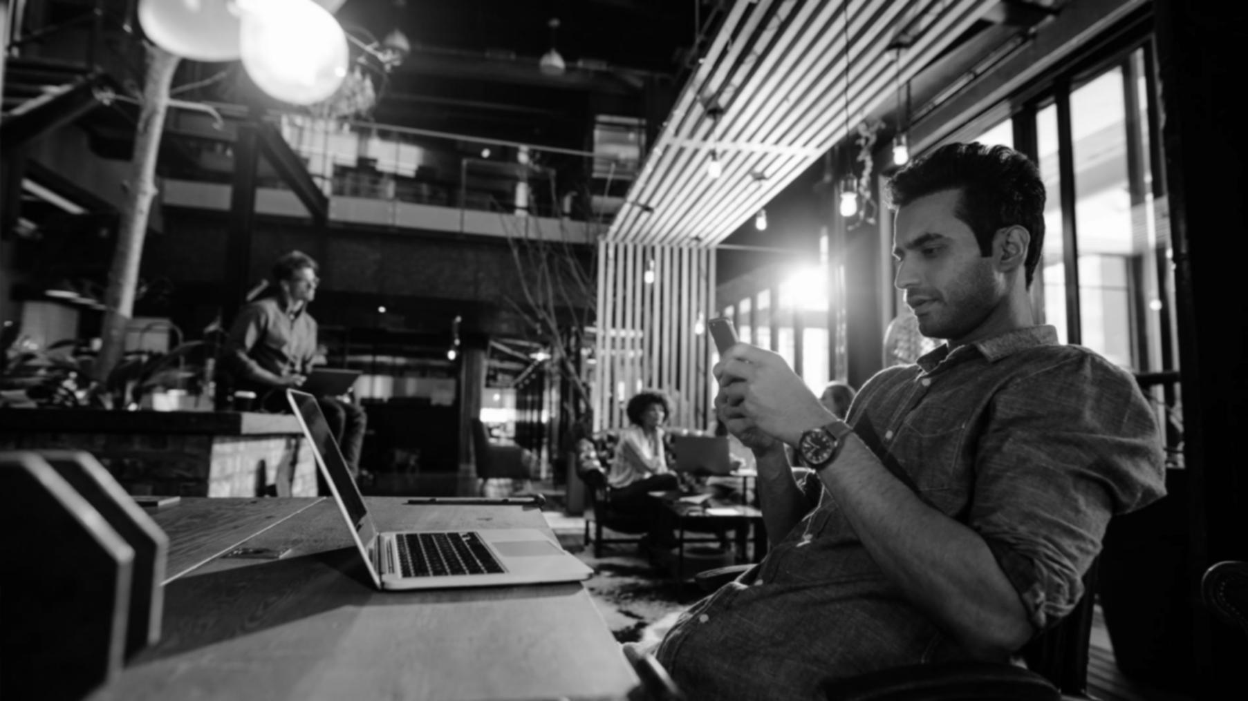 Students working on mobile optimization projects